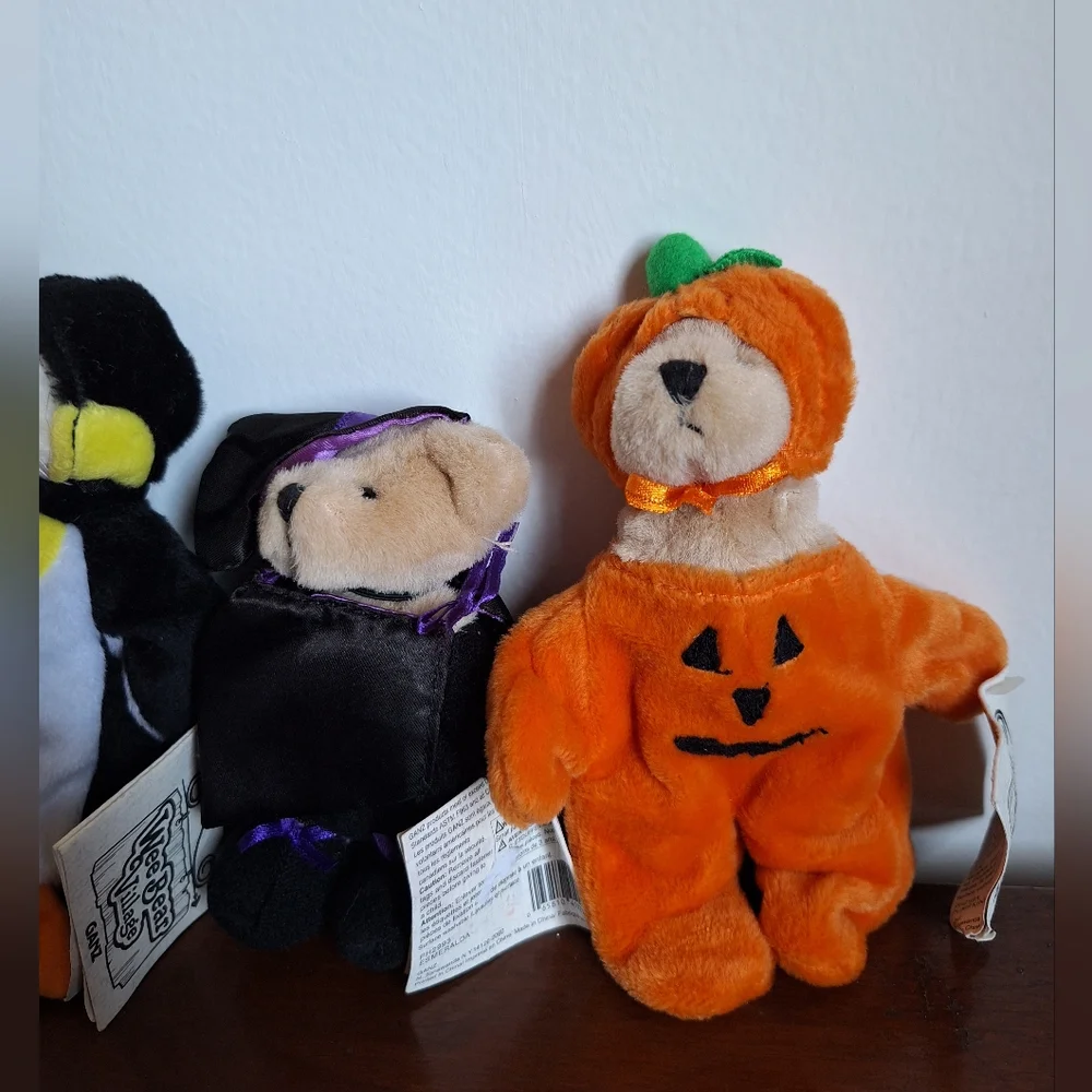 Collectible teddy bears from the Ganz brand, specifically from the Wee Bear Vill